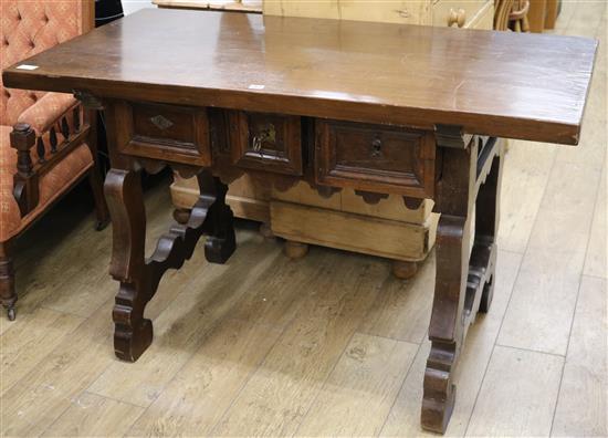 A Spanish walnut side table W.134cm